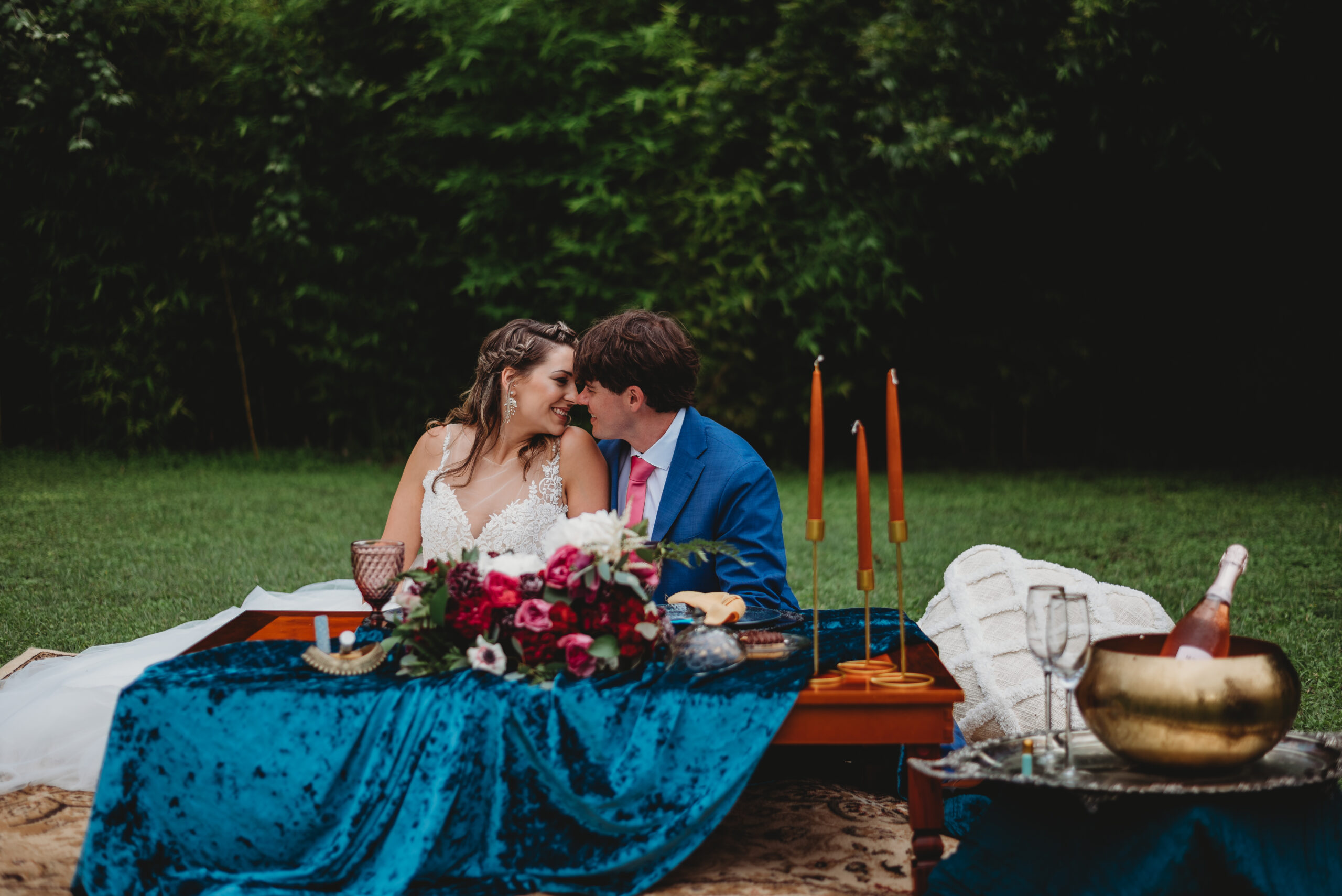 Boho table details with bride and groom